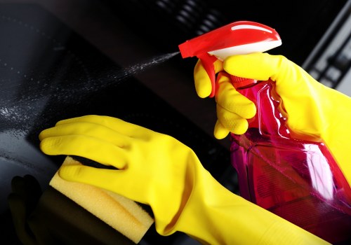 Staff member assessing workplace hazards before cleaning begins