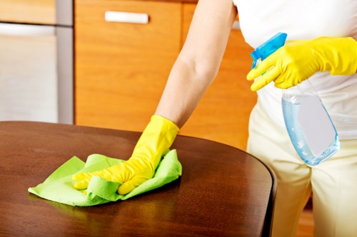 Supervisor promoting safe working conditions in a cleaning workplace